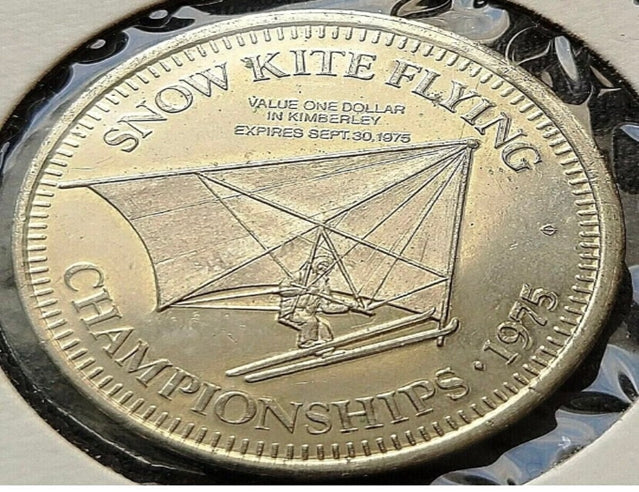 1975 Kimberley British Columbia 1 Trade Dollar – Snow Kite Flying