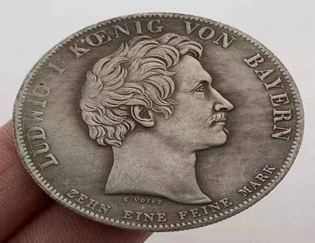 Hobo Coin - Lion en colère dans une capsule de protection en plastique gravée en cuivre